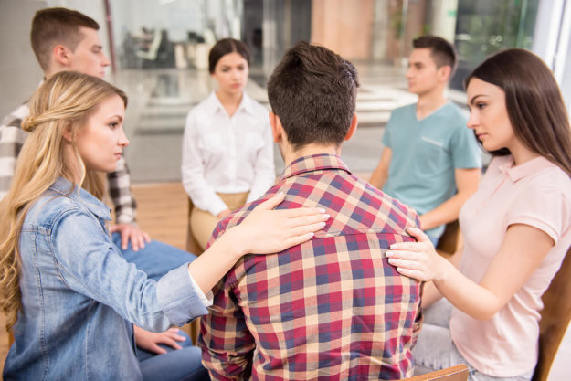 alcohol addiction treatment jacksonville people participate in group therapy as part of the alcohol addiction treatment Jacksonville offers