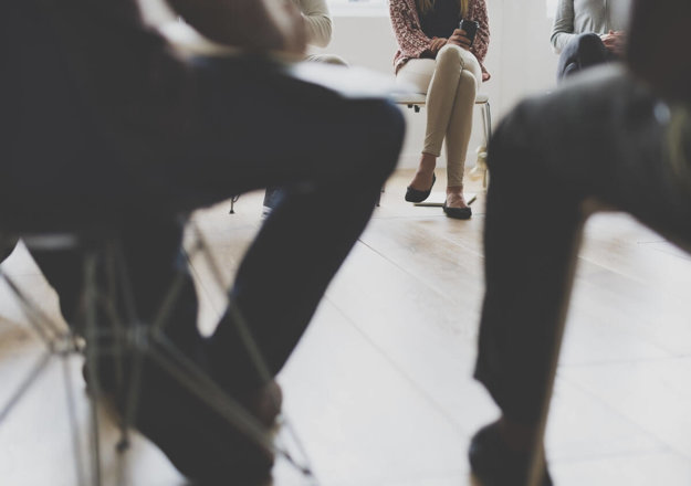 a group therapy session at an alcohol detox center near houston
